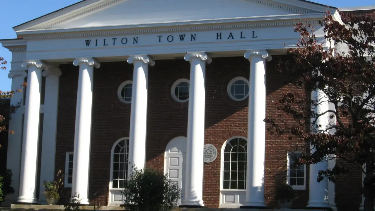 Wilton Town Hall, a brick Greek Revival building with white columns, Wilton, Connecticut